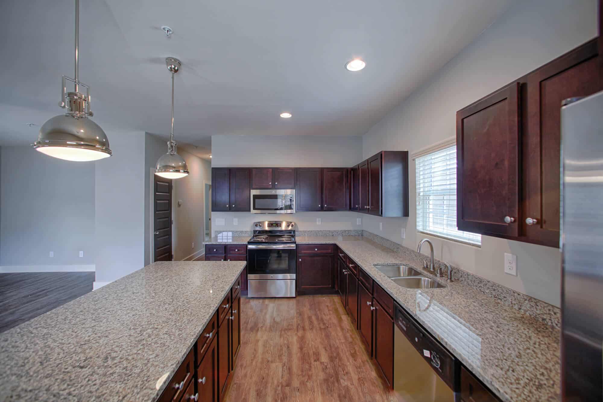 the-collective-at-kennesaw-apartments-near-ksu-kitchen-granite-countertops-stainless-steel-appliances